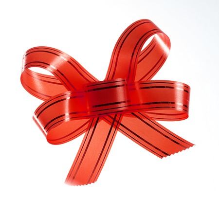 red bow ribbon isolated on whiteの写真素材