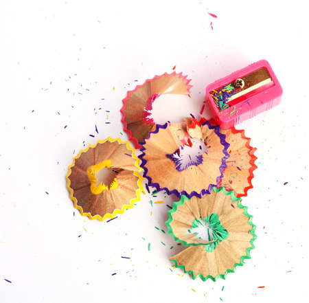colored pencils  and a pencil sharpenerの写真素材