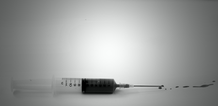 syringe with bloodの写真素材
