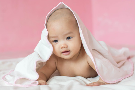 beautiful bright portrait of adorable babyの写真素材