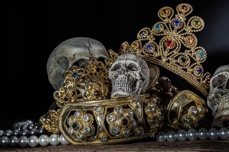Still life Skull with Treasure Gold jewelry, pirate concept.の写真素材
