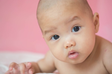 beautiful bright portrait of adorable babyの写真素材