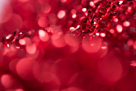Red bokeh holiday textured Christmas decorations backgroundの写真素材