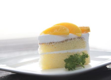 orange on white cakeの写真素材