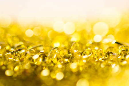 Gold spring or summer, Christmas Glittering background.Holiday abstract textureの写真素材