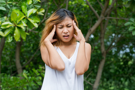 Close up of woman with headache.の写真素材