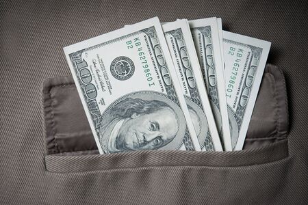 Dollar money in pocketの写真素材