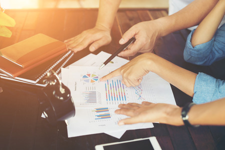 Close-up shot of an analytical team working with the latest financial results, Office life concept.の写真素材