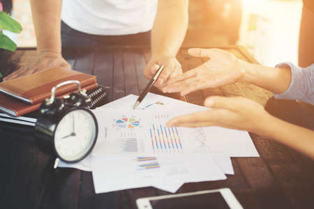 Close-up shot of an analytical team working with the latest financial results, Office life concept.の写真素材