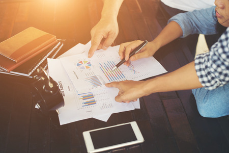 Close-up shot of an analytical team working with the latest financial results, Office life concept.