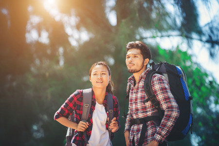 Young couple go adventure hiking together on vacation.の写真素材