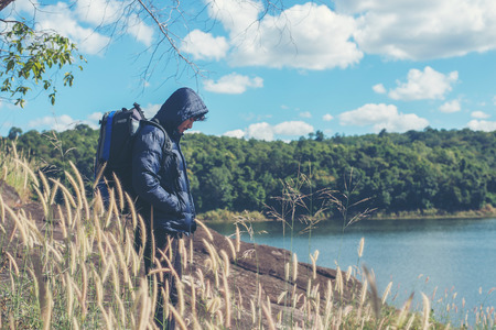 Hiker man adventure on vacation. Holiday tourism concept.の写真素材
