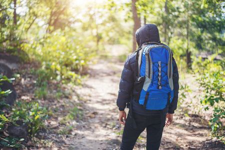Hiker man adventure on vacation. Holiday tourism concept.の写真素材
