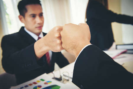 Business people showing Fist Bump after meeting partnership. Teamwork Concept.の写真素材