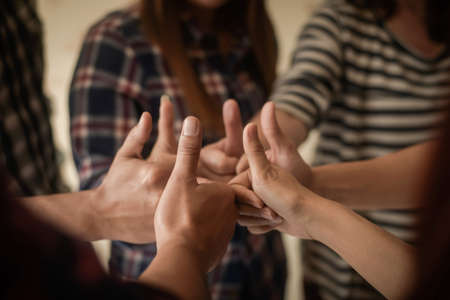 Business group showing joins thumbs up. success business concept.の写真素材