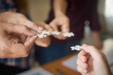 Hand holding jigsaw puzzles, Business partnership concept.の写真素材