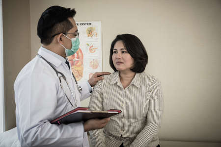 doctor in white uniform gown checkup patient's health ,Physician check up.の写真素材