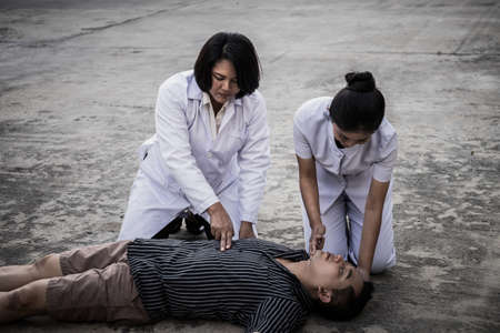 Emergency CPR on a Man, Nurse try to Process Resuscitation (First Aid)の写真素材