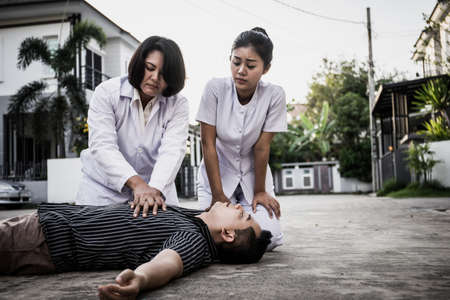 Emergency CPR on a Man, Nurse try to Process Resuscitation (First Aid)の写真素材
