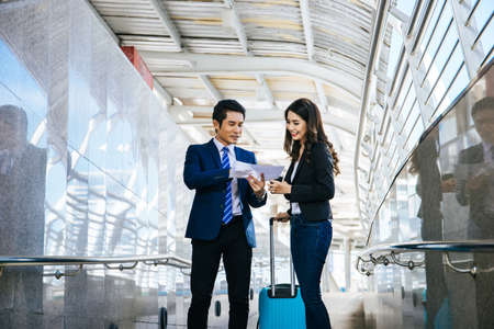 Portrait of two business people meeting before go to traveling. Business travel conceptの写真素材