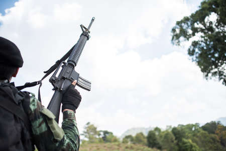 Soldier ready his weaponの写真素材