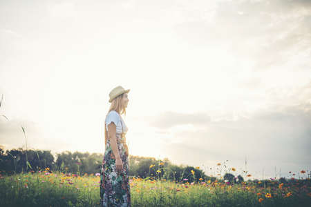 Young woman walking in a park, Relax concept