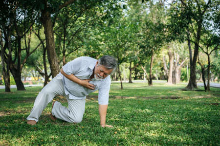 Old man having a chest painの写真素材