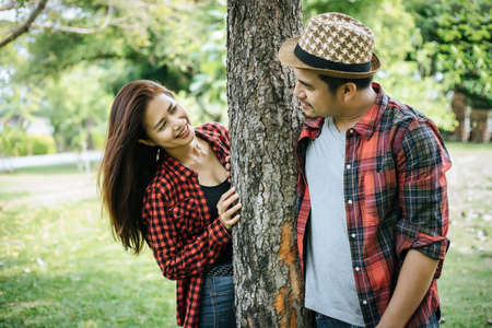 Happy to be together. beautiful young loving couple standing outdoorsの写真素材