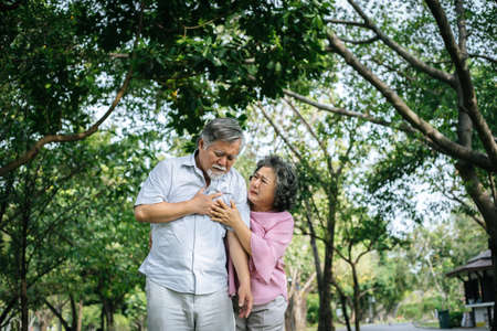 Old man having a chest painの写真素材