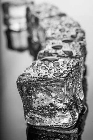 Ice cubes with water dropの写真素材