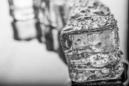 Ice cubes with water dropの写真素材
