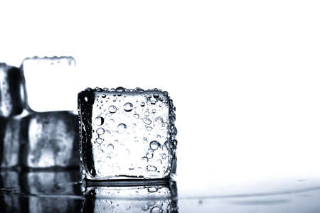 Ice cubes with water dropの写真素材