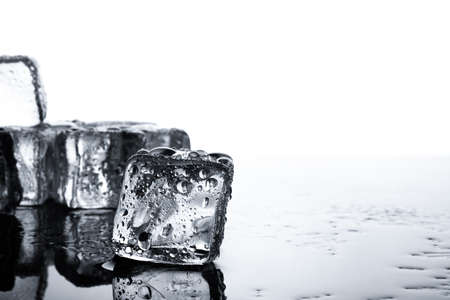 Ice cubes with water dropの写真素材