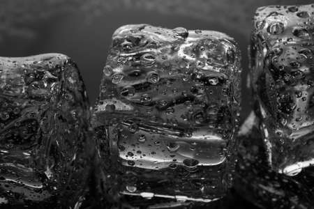 Ice cubes with water dropの写真素材