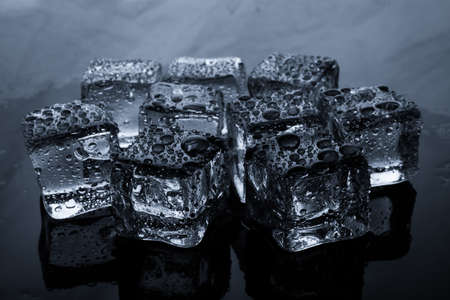 Ice cubes with water dropの写真素材