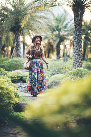 Beautiful Young Woman Outdoors. Enjoy Nature. Healthy Smiling Girl in The Parkの写真素材