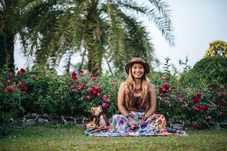 Beautiful Young Woman Outdoors. Enjoy Nature. Healthy Smiling Girl in The Parkの写真素材