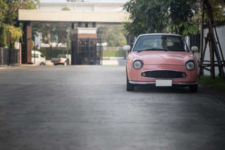 Vintage classic  car parked in a streetの写真素材