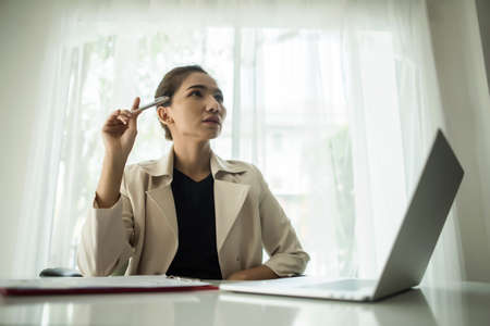 Young business people are suffering from headachesの写真素材