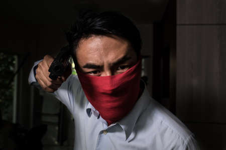 man with pistol handgun weaponの写真素材
