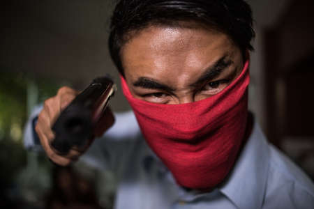 man with pistol handgun weaponの写真素材