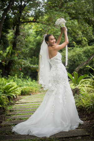 Beautiful Bride with wedding bridal bouquet.の写真素材