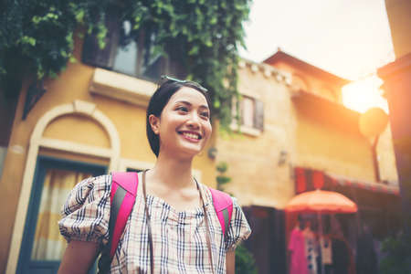 Close up of hipster woman travel in urban happy with holiday time.の写真素材