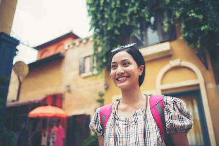 Close up of hipster woman travel in urban happy with holiday time.の写真素材