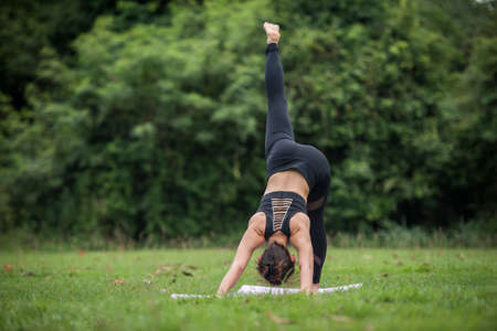 Yoga action exercise healthy in the parkの写真素材