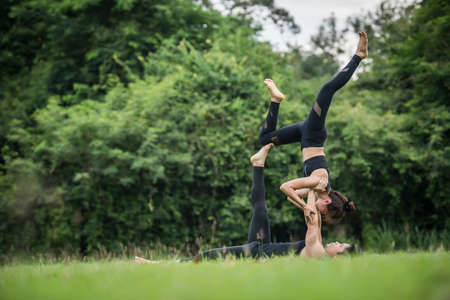 Yoga action exercise healthy in the parkの写真素材