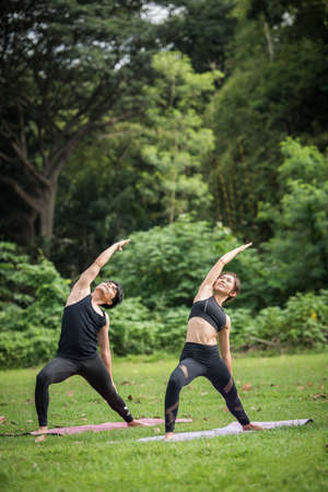 Yoga action exercise healthy in the parkの写真素材