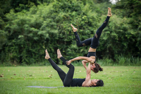Yoga action exercise healthy in the parkの写真素材