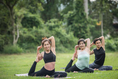 Yoga action exercise healthy in the parkの写真素材