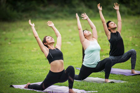 Yoga action exercise healthy in the parkの写真素材